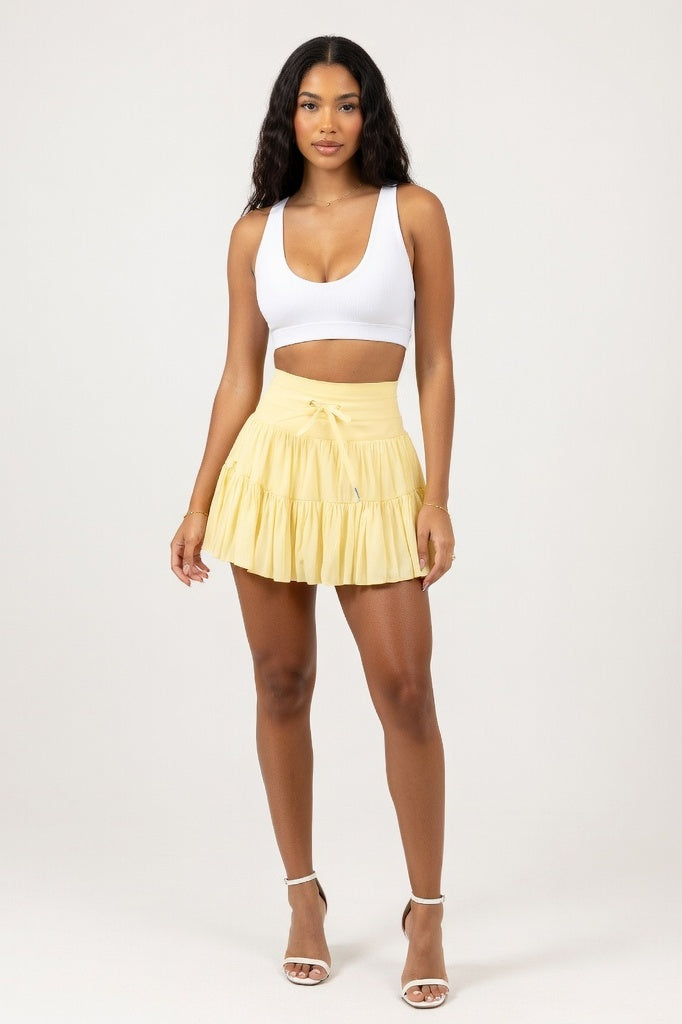 High-Waist Lace-Up Mesh Pleated Mini Skirt — Yellow