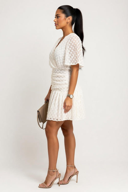 Pleated Check Mini Skirt — side view