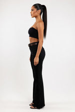 Tassel Flared Trousers — side view